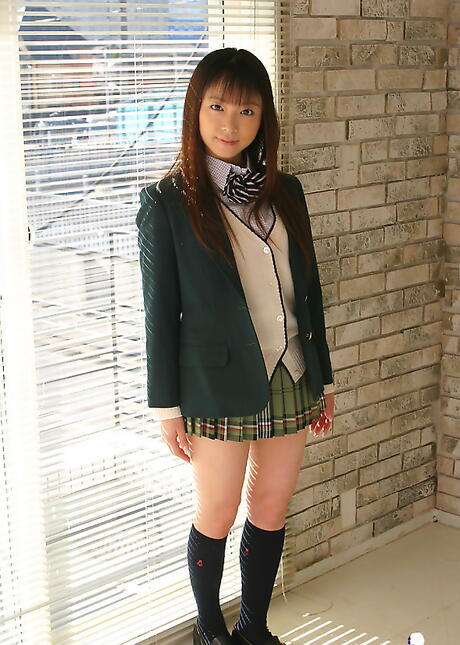 Rangy japanese teen Emiru Momose bares tiny tits and sexy ass 